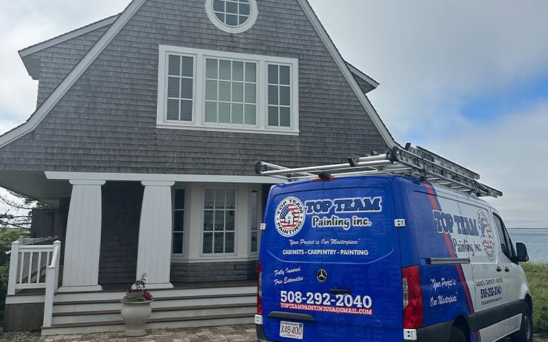 Top Team Painting van outside a Cape Cod home